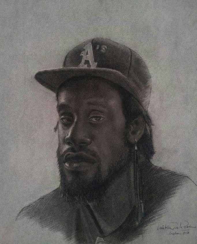 Hand-drawn graphite portrait of a man wearing a baseball cap